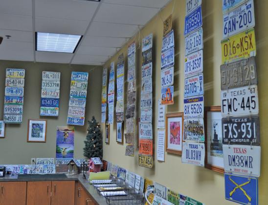 A collection of license plates from all 50 states hangs in the Lampasas County Tax Assessor-Collector’s office. erick mitchell | Lampasas Dispatch Record