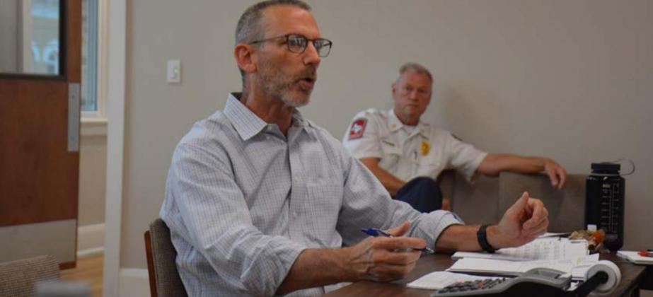 City Manager Finley deGraffenried talks to the Lampasas City Council during a budget roundtable session earlier this month, as Fire Chief Jeff Smith listens in the background. MONIQUE BRAND | DISPATCH RECORD